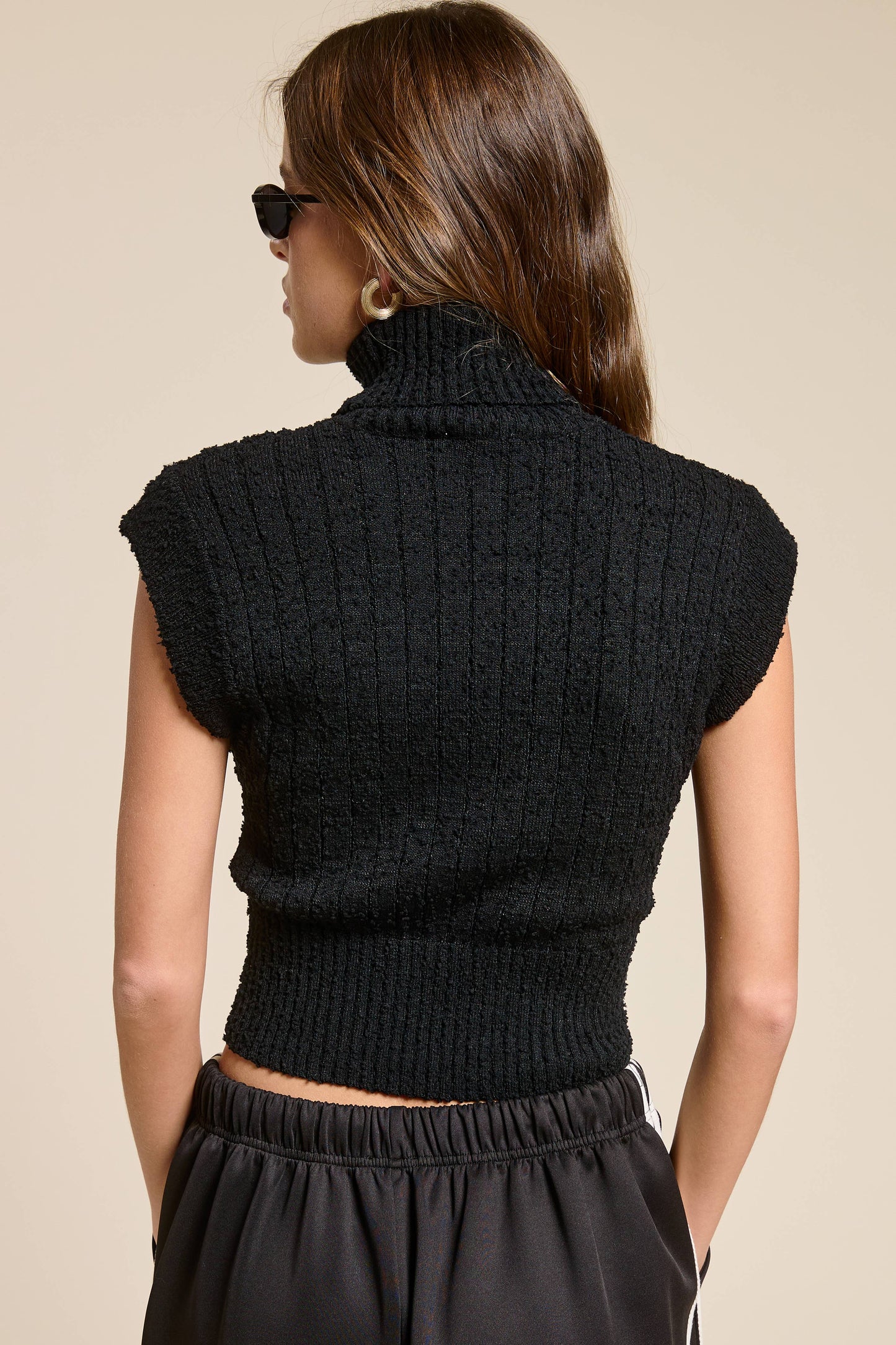 Sleeveless Ribbed Knit Turtleneck Sweater