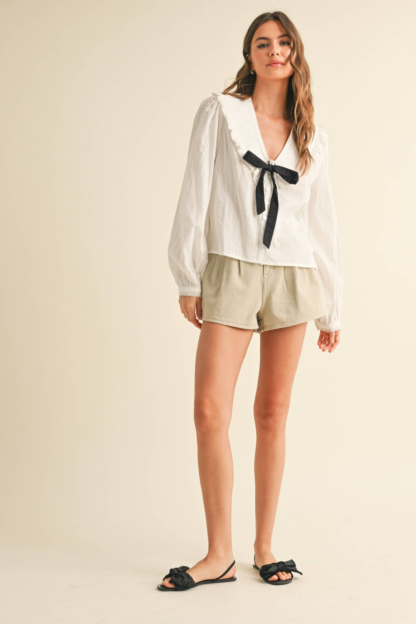 TEXTURED FABRIC WITH TIE IN THE FRONT BLOUSE