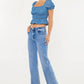 MEDIUM WASH HIGH RISE WIDE LEG FLARE JEANS