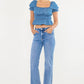 MEDIUM WASH HIGH RISE WIDE LEG FLARE JEANS