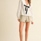 TEXTURED FABRIC WITH TIE IN THE FRONT BLOUSE