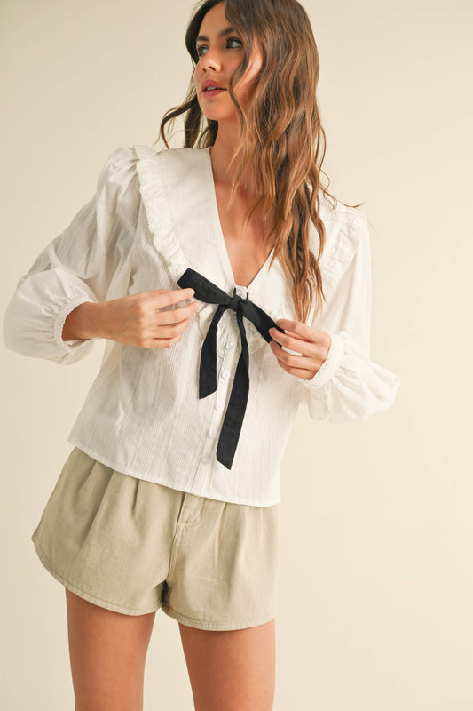 TEXTURED FABRIC WITH TIE IN THE FRONT BLOUSE